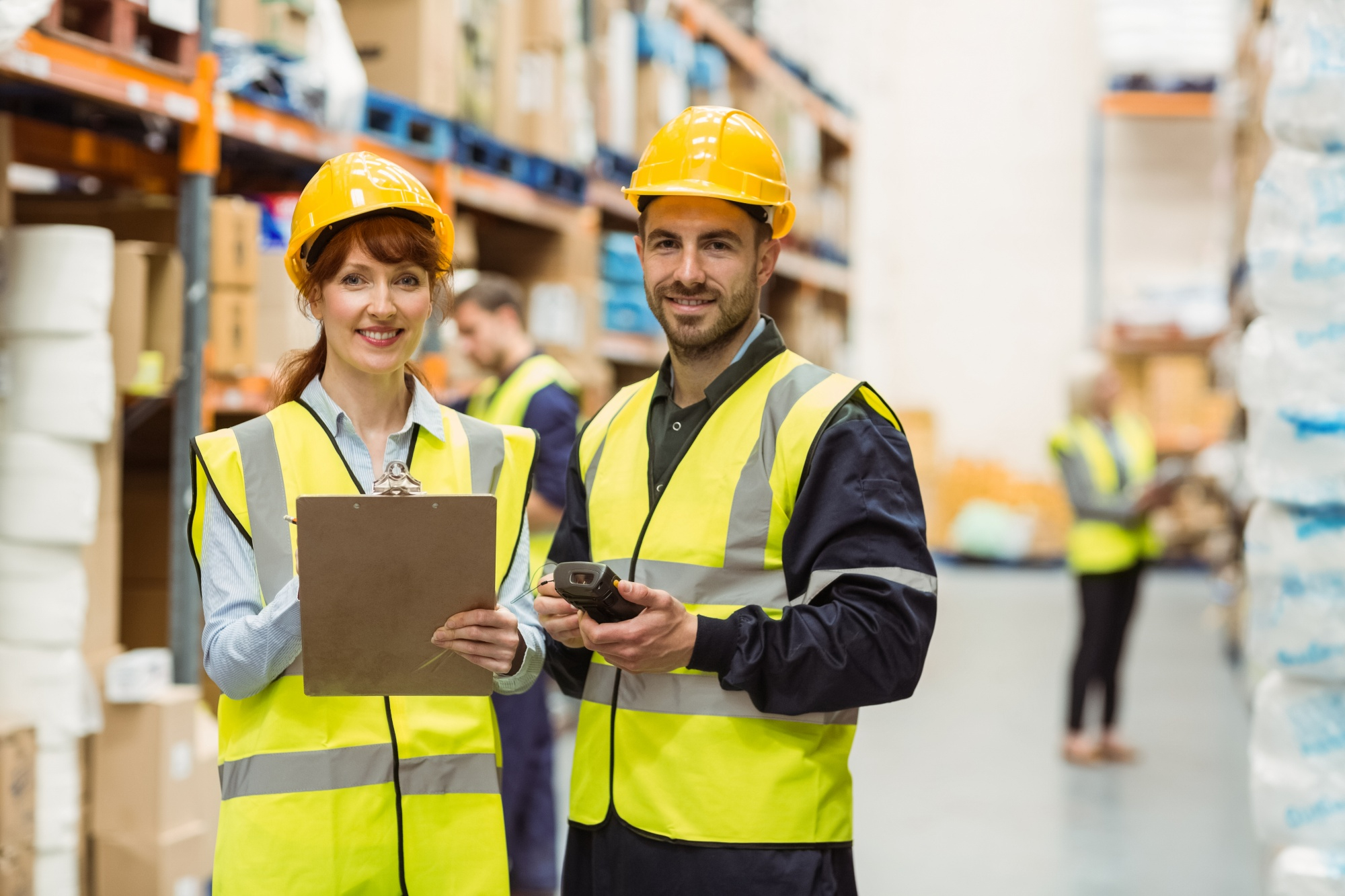 Warehouse team coordinating logistics and shipments